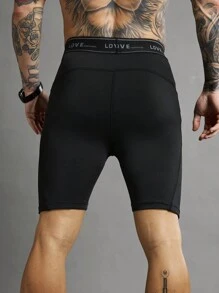 Manfinity Sport Polished Pantaloncini sportivi aderenti da uomo con fascia in costina a righe