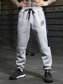 Manfinity Sport PWRUP Pantalones de chándal rectos y sueltos con estampado de letra y cordón en la cintura, estilo novio para hombre
