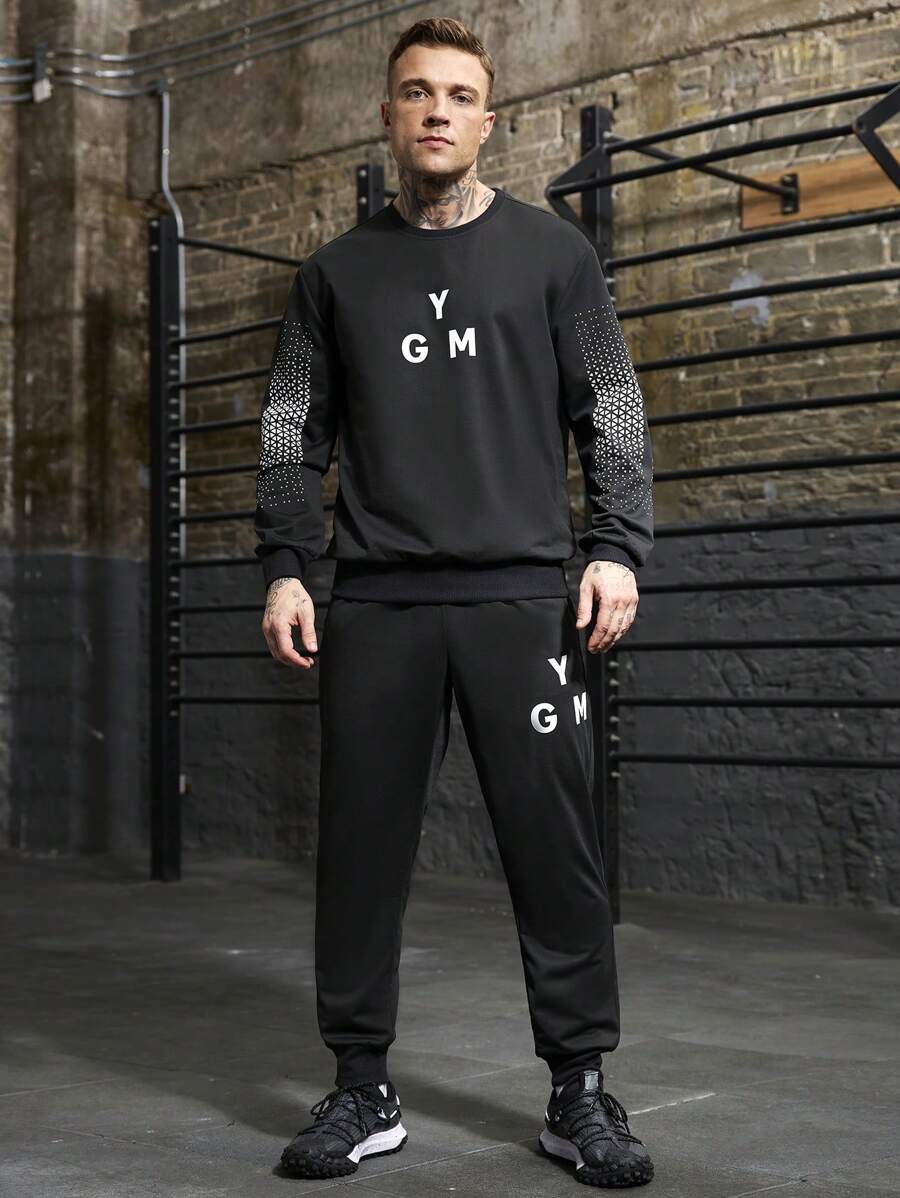 Gym Rark Tuta sportiva da uomo con stampa di lettere, composta da maglia a maniche lunghe con collo rotondo e pantaloni lunghi, adatta per palestra e allenamento - nero - Visualizzare 1
