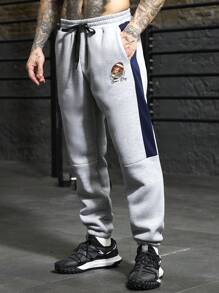 Manfinity Sport PWRUP Pantalones de chándal rectos y sueltos con estampado de letra y cordón en la cintura, estilo novio para hombre