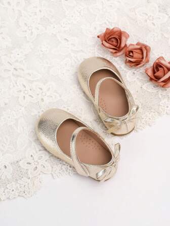 1 par mode- och bekväma platta skor i guld för flickor, populär design