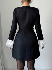 Elenzga Vestido corto negro sexy y elegante con decoración de botón metálico y volantes en los puños, con silueta de línea A