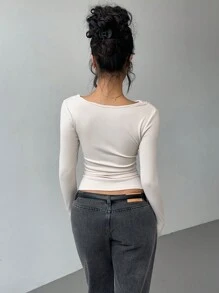 SHEIN Essnce T-shirt slim plissé de couleur unie pour femmes, pull à design croisé à manches longues pour femmes. Top polyvalent de base couleur abricot pour l'automne et l'hiver