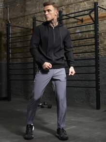 Manfinity Sport Corelite Boyfriend Style Heren Casual Effen Kleur Trekkoord Capuchon Sportjack, Actieve Kleding Lange Mouw Volledige Ritssluiting Sportjack