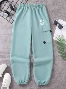 SHEIN Explorewe Spodnie casualowe dla nastolatków/młodych chłopców z nadrukiem uśmiechniętej twarzy, modne spodnie robocze