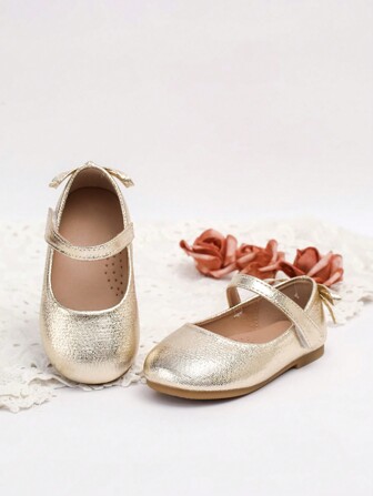 1 par mode- och bekväma platta skor i guld för flickor, populär design