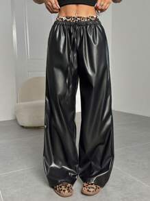 SHEIN EZwear Pantalones sueltos y casuales con cintura elástica, patchwork de estampado de leopardo y de PU