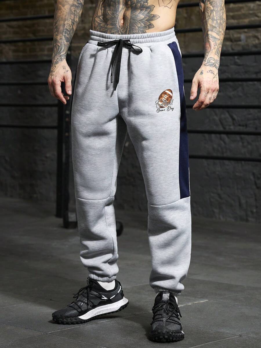 Manfinity Sport PWRUP Pantalones de chándal rectos y sueltos con estampado de letra y cordón en la cintura, estilo novio para hombre