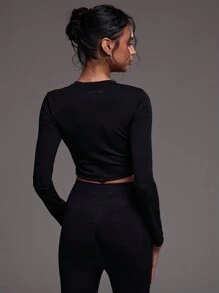 Musera Sport 圆领镂空长袖上衣，适合板式网球、网球、匹克球等运动和健身房穿着