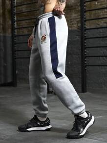 Manfinity Sport PWRUP Pantalones de chándal rectos y sueltos con estampado de letra y cordón en la cintura, estilo novio para hombre