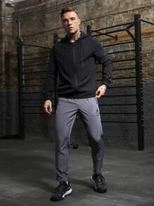 Manfinity Sport Corelite Boyfriend Style Heren Casual Effen Kleur Trekkoord Capuchon Sportjack, Actieve Kleding Lange Mouw Volledige Ritssluiting Sportjack