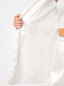 SHEIN EZwear بذلة سهرة نسائية فضفاضة كاجوال، بسترة بدنية لامعة وبنطال ذو ساق واسعة، باللون الأسود - أبيض - مشاهدة 7