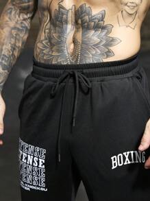 Manfinity Sport Corelite Freund-Stil Herren Pullover mit Kapuze und Schnürung, Langarm, Buchstaben-Muster, und Jogginghose, Sportanzug