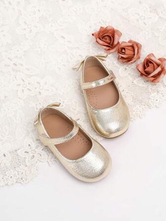 1 par mode- och bekväma platta skor i guld för flickor, populär design