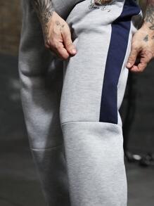 Manfinity Sport PWRUP Pantalones de chándal rectos y sueltos con estampado de letra y cordón en la cintura, estilo novio para hombre