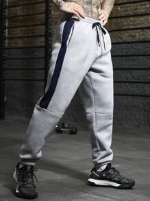 Manfinity Sport PWRUP Pantalones de chándal rectos y sueltos con estampado de letra y cordón en la cintura, estilo novio para hombre