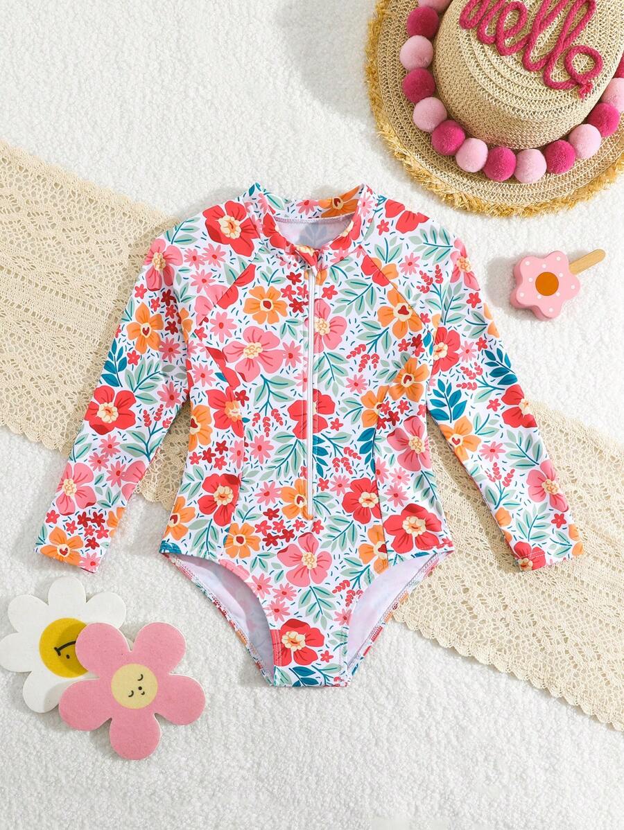 年轻女孩热带花卉印花拉链长袖休闲 T 恤款式连体泳衣