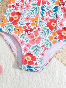 年轻女孩热带花卉印花拉链长袖休闲 T 恤款式连体泳衣