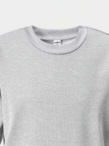 SHEIN Conjunto de chándal de niña preadolescente con parte superior de manga larga con cuello redondo y estampado de letras y colores en bloque, y pantalones de cintura elástica