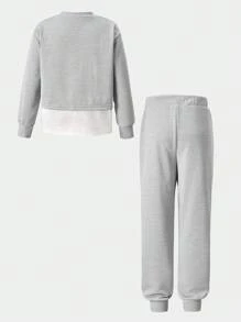 SHEIN Conjunto de chándal de niña preadolescente con parte superior de manga larga con cuello redondo y estampado de letras y colores en bloque, y pantalones de cintura elástica