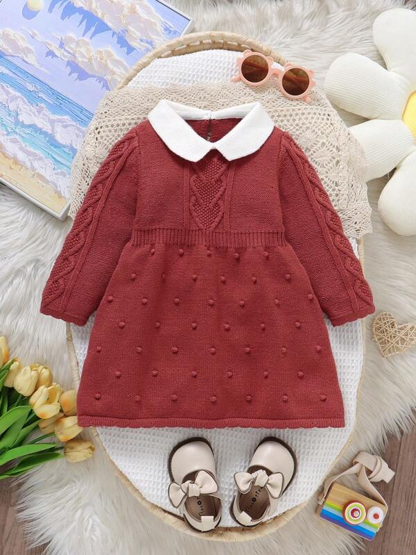 SHEIN Exquisite Toddler Girls' Knitted Dress, With Peter Pan Collar, Sweet And Charming, Long Sleeve Design For Comfort. Jacquard Heart Pattern On The Bust, Showcasing Craftsmanship. Polka Dot Hem Cleverly Decorates, Adding Playfulness, Making The Baby The Fashion Focus In Winter