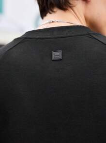 Manfinity Sport Corelite Męska koszulka sportowa z nadrukiem w kształcie litery, okrągłym dekoltem i długim rękawem, minimalistyczny design