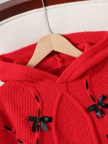 SHEIN Moda para meninas pré-adolescentes, suéter com capuz solto vermelho com laço 3D preto e padrão de linha, outono/inverno
