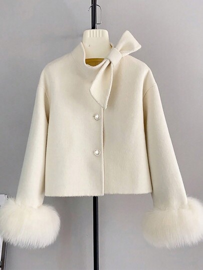 GlowEve Abrigo elegante de mujer de unicolor con puños de piel y decoración de lazo, para otoño/invierno