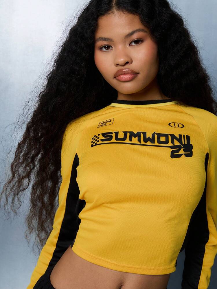 SUMWON WOMEN メッシュデザインのスポーティなクロップド丈ロングスリーブトップス
