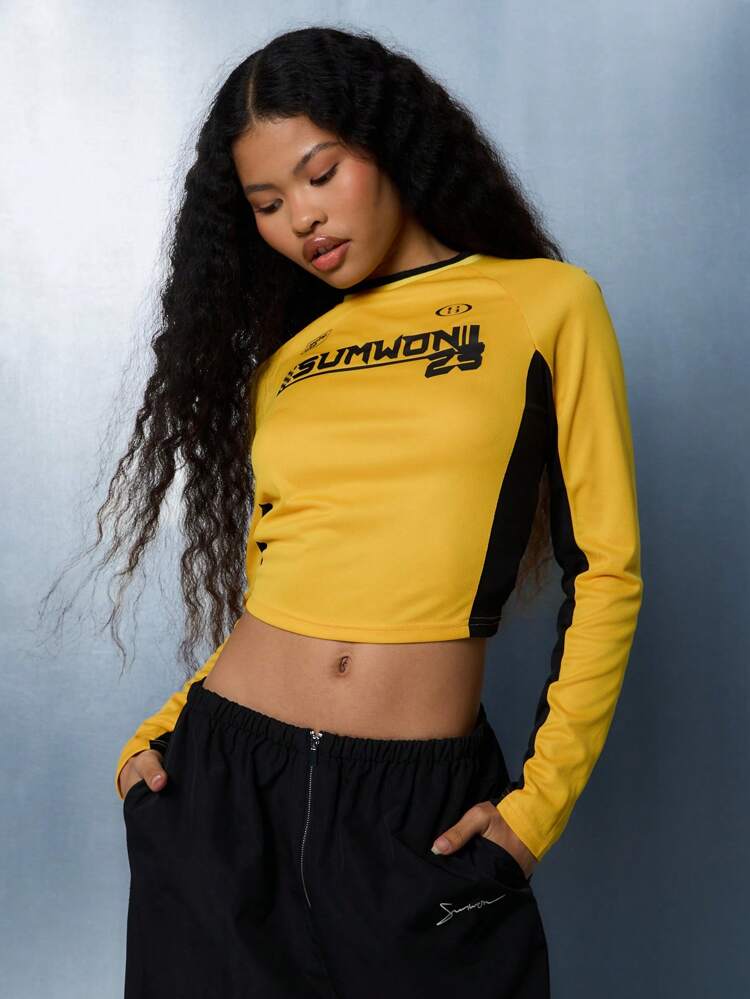 SUMWON WOMEN メッシュデザインのスポーティなクロップド丈ロングスリーブトップス
