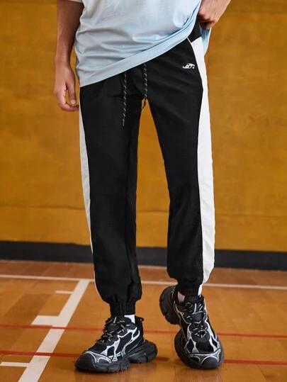 Manfinity Sport Corelite Men's Solid Color Patchwork Front Lace-Up Print Casual Sports Pants Sweat Pants