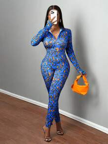 Slaydiva Tuta aderente da donna con scollo tondo, chiusura lampo, fantasia a patchwork leopardata