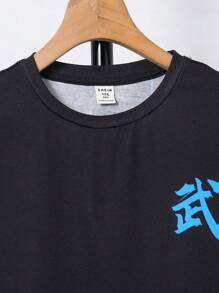 SHEIN Conjunto informal de camiseta de manga corta que brilla en la oscuridad y pantalones cortos para niño preadolescente