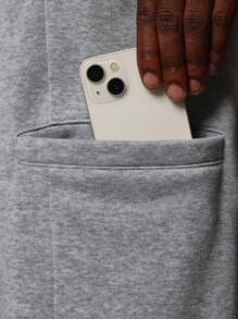 SUMWON Pantalones deportivos premium de ajuste suelto estilo jogger, cómodos y de forro polar para el invierno, para hacer ejercicio o descansar, con cordón y bolsillos laterales