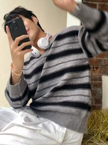 Manfinity Dauomo Jersey holgado de cuello en V a rayas de manga larga para hombre, otoño/invierno