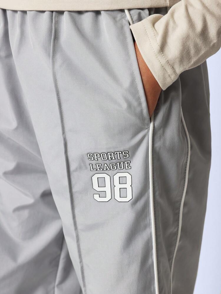 Pantaloni da tuta con gamba ampia per ragazze pre-adolescenti, con pieghe e dettagli di bordatura