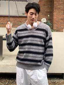 Manfinity Dauomo Jersey holgado de cuello en V a rayas de manga larga para hombre, otoño/invierno