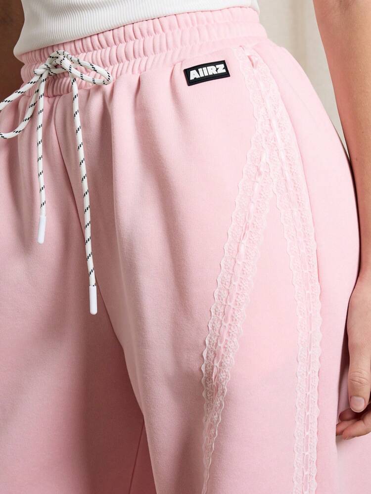 Lässige Loungewear-Jogginghose mit weitem Bein und Spitzendetail