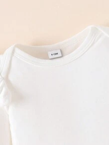 2 sztuki/zestaw Modny kombinezon dla dziewczynki w minimalistycznym stylu "Mój pierwszy nowy rok" z kokardą i nadrukiem z długim rękawem oraz rozszerzanymi nogawkami ze wzorem balonów i fajerwerków, odpowiedni na wiosnę i jesień