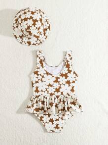 Conjunto de niña con traje de baño de una pieza, sombrero ancho y vestido de playa estampado