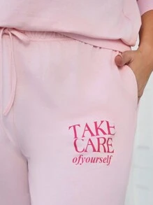 SHEIN LUNE Conjunto de 2 piezas de sudadera y pantalón de chándal con estampado de letras y cuello redondo para mujer talla grande, conjunto de atuendo de otoño/invierno y vacaciones