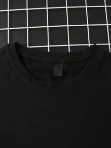 Manfinity Homme Camiseta de manga corta negra de talla grande para hombre, con estilo informal y deportivo, con impresión numérica y de letras, para el verano