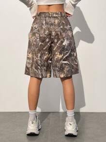 SHEIN EZwear Pantalones cortos anchos de mujer informales con estampado de camuflaje