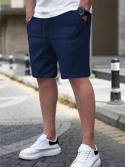 Manfinity Homme Men's Solid Color Drawstring Waist Casual Shorts With Pockets