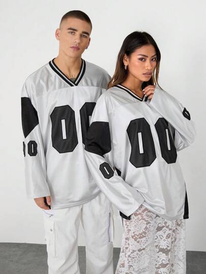 Manfinity VCAY Camiseta de manga larga, cuello en V, holgada, de tejido de punto de poliéster, con patchwork y perforaciones, unisex