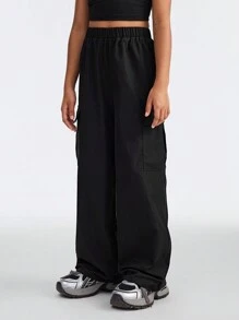 SHEIN Pantalones cargo negros lisos y cómodos para niñas preadolescentes en primavera/verano