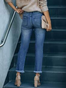 Jeans ajustados de mujer con rodillas rotas y desgastados, de mezclilla elástica