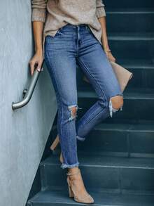 Jeans ajustados de mujer con rodillas rotas y desgastados, de mezclilla elástica