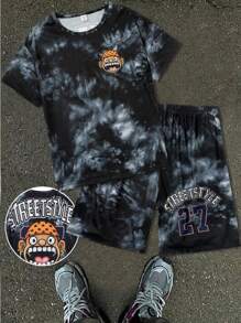 Conjunto de primavera/verano de 2 piezas para niño preadolescente: Camiseta de manga corta con estampado de cara de dibujo animado grande + Pantalones cortos de playa con estampado de letras y números