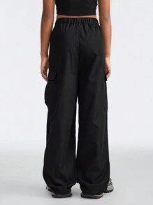 SHEIN Pantalones cargo negros lisos y cómodos para niñas preadolescentes en primavera/verano